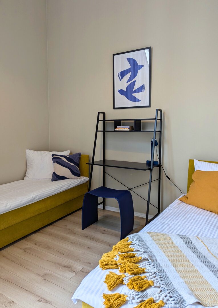 Private double room with shared bathroom, courtyard side. Private double room with shared bathroom, courtyard side.